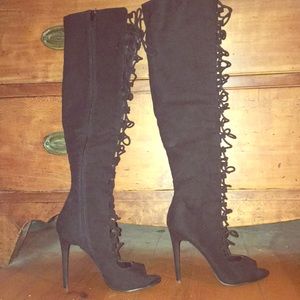 Lace up high heeled boots